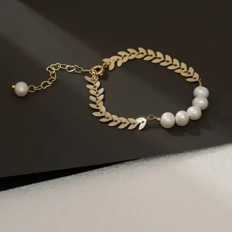 Golden Bracelet for Women – Elegant Leaf & Pearl Design Hand Jewelry
